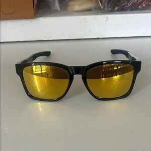 Oakley Black and Gold Sunglasses